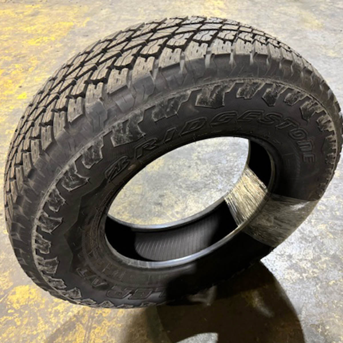 2457517 245/75R17 - 112T Bridgestone Dueler A/T tire single